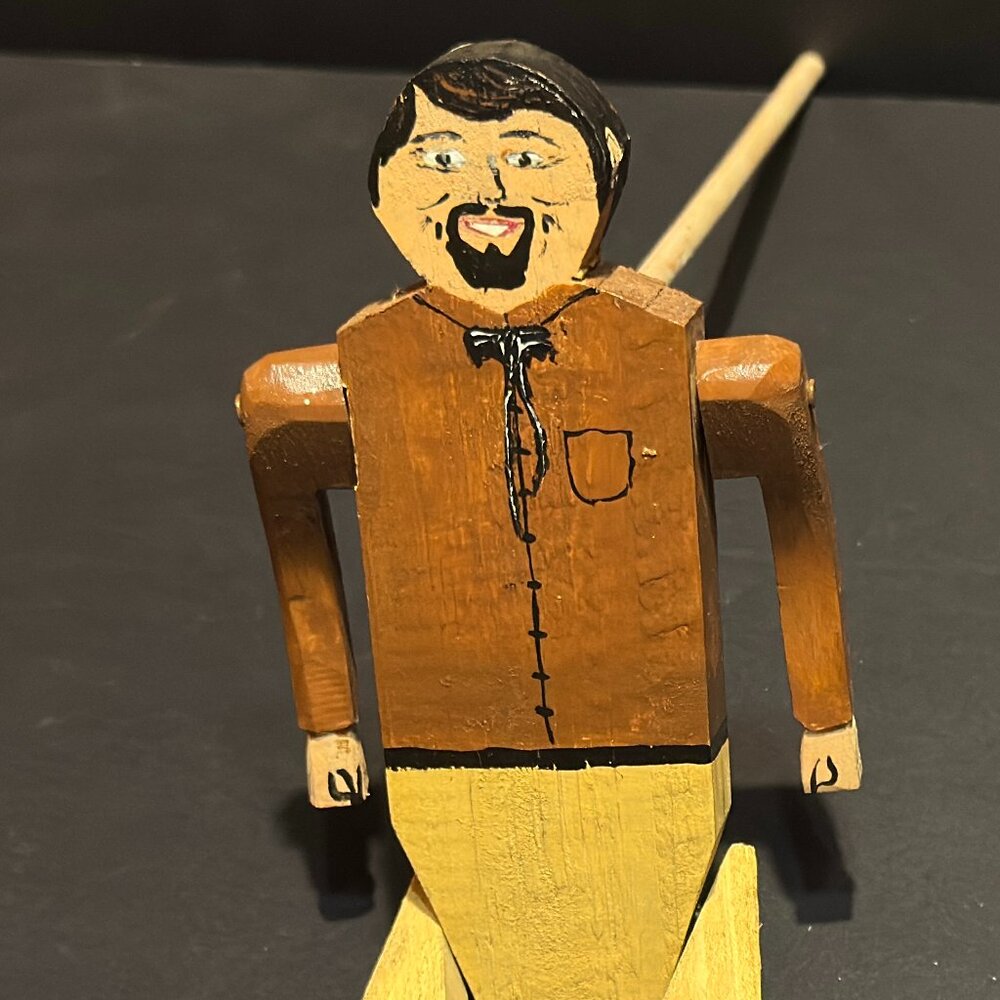 Wooden stick jigging man